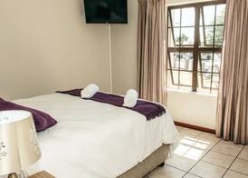 2-Bedroom Apartment within 1km of The Point Beach 3