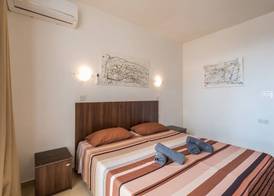 Seashells 2 bedroom Apartment with sunny terrace with stunning panoramic sea views by Getaways Malta 2