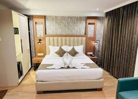 Grand Plaza Inn by RAK Rooms, Kannur 3