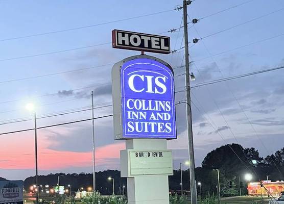COLLINS INN & SUITES 1