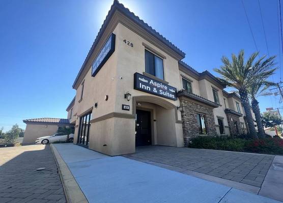 ASPIRE INN & SUITES Orange 1