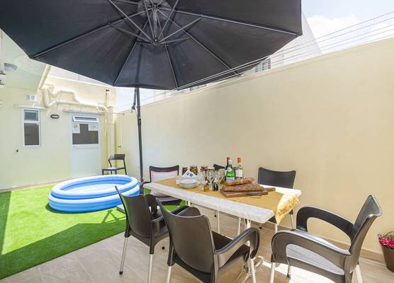 Summer Breeze Maisonette with Terrace by Getaways Malta 1