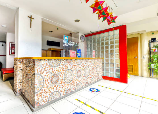 Vaccinated Staff - OYO 842 City Smiles Apartelle 1