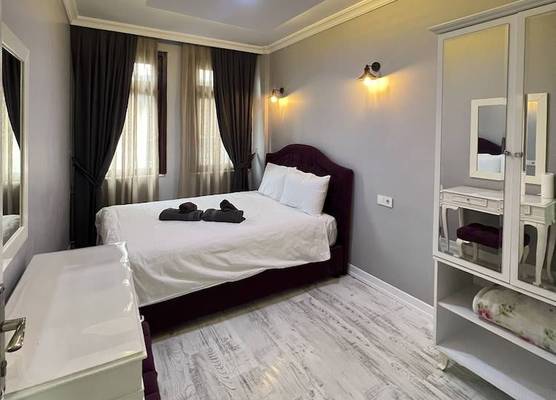 TAKSİM CMLM Suit 1