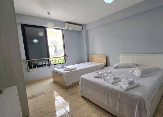 Tirent Apartment - Cozy Bedrooms Stay by Golem Beach. 1